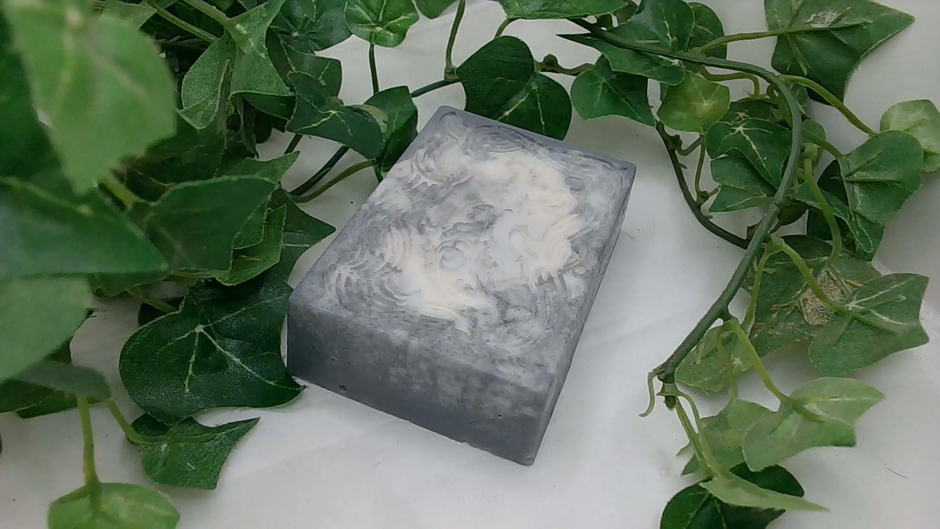 Lemongrass and Cypress infused in Bamboo Charcoal Oatmeal Soap