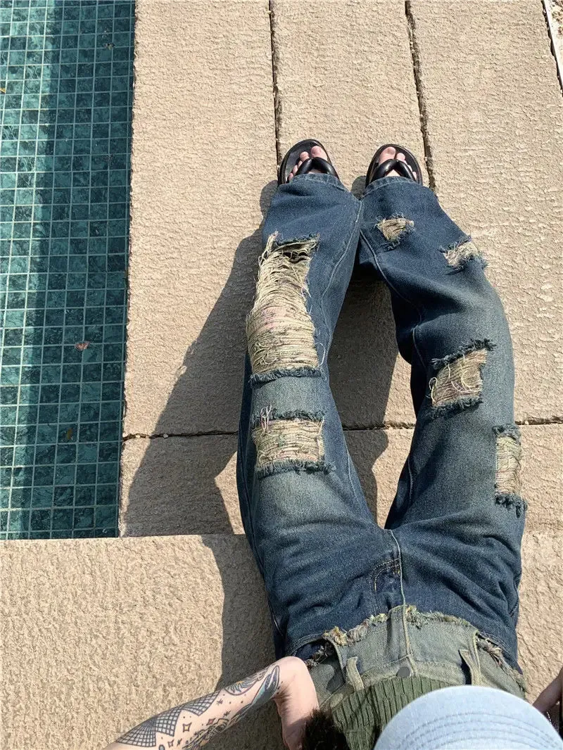 Loose-Fitting Jeans With Wide Legs And Ripped Design