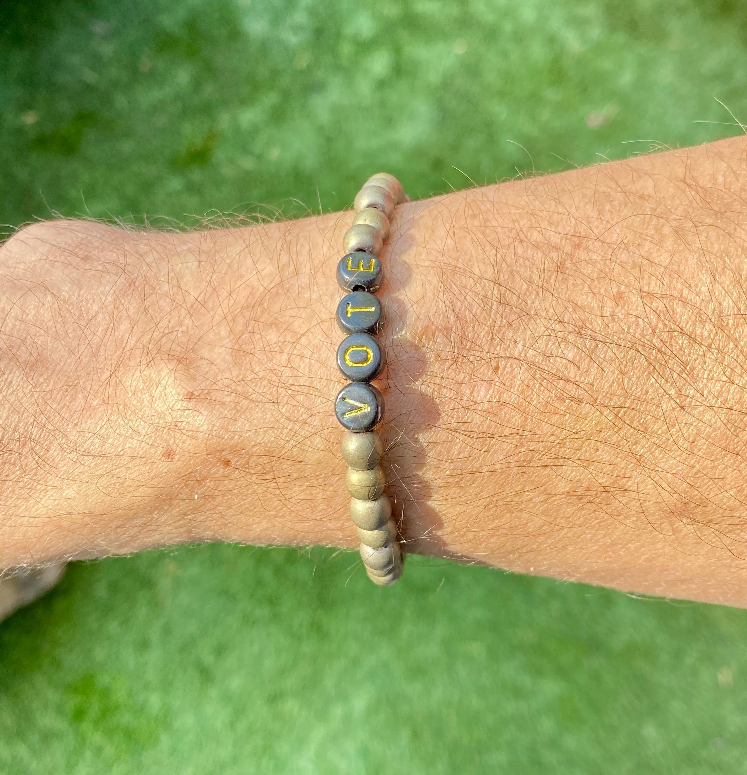 Men’s Matte Gold Hematite “Vote” With Howlite Peace Sign