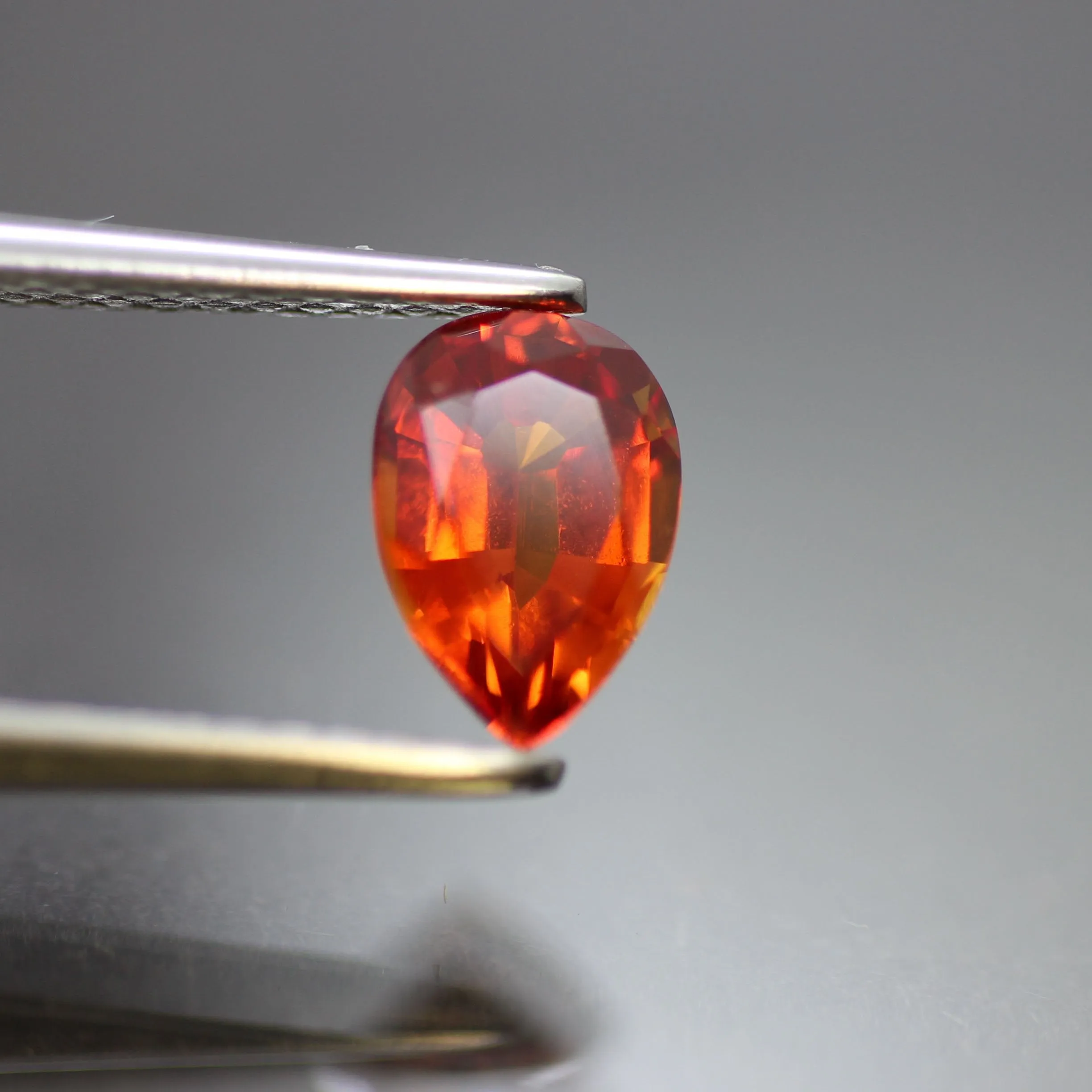 Padparadscha Sapphire | lab created, pear cut 7 x 5mm, VS 0.7ct