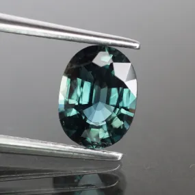 Sapphire | natural, teal (bluish green color changing), oval cut 8x6 mm, IF, 1.68 ct, Thailand