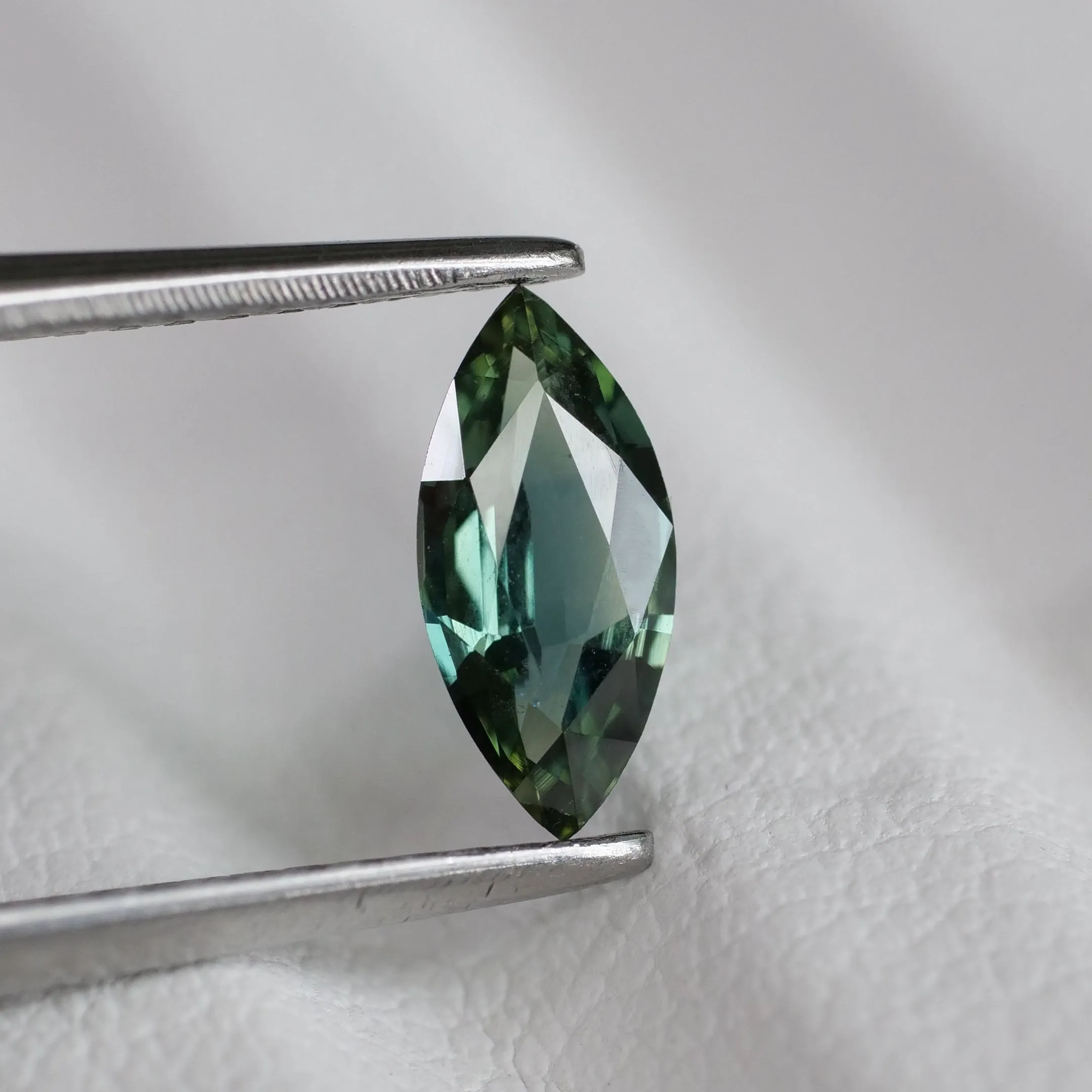 Sapphire teal | natural, greenish blue color, marquise cut 8x4 mm, 0.56 ct, Australia